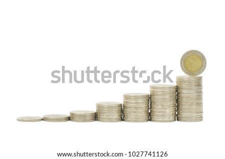 coins stack with one coin win standing on coin pipe isolated on white background and reflection with clipping path. financial and saving winner concept.