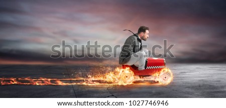 Fast businessman with a car wins against the competitors. Concept of success and competition Royalty-Free Stock Photo #1027746946