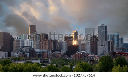 Unique view of Denver Colorado skyline with sun star