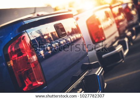 Brand New Pickup Trucks For Sale. Car Dealership Stock. Automotive and Transportation Industry. Royalty-Free Stock Photo #1027782307