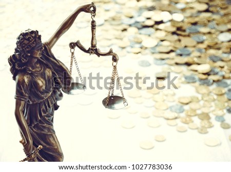 Statue of justice on money background. Law. Justice.