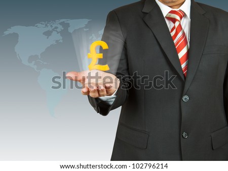 Businessman with pound symbol over his hand
