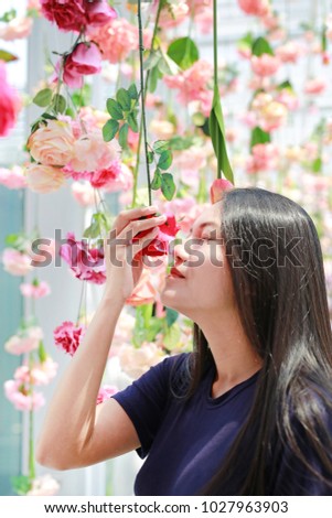 Female sniff rose on a sunny day. Surrounds the flowering.