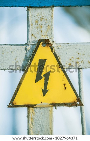 sign lightning, stop kill, triangle, yellow background high voltage electricity, danger