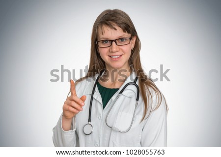 Close up of female doctor with stethoscope - medical concept