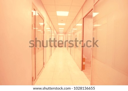 door glass plastic corridor, new office building, office rental, light blurred corridor background