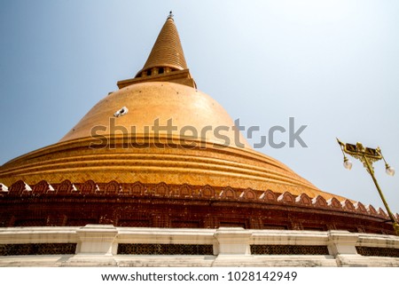 Big Golden Pagoda Phra Pathom Chedi with blue sky, Nakhon Pathom province, Thailand