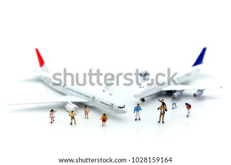 Miniature people : children and student with airplane background,travel and education concept.