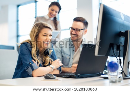 Group of business people and software developers working as a team in office Royalty-Free Stock Photo #1028183860