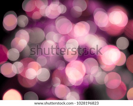 Glowing pink soft blurred round lights decorative celebration or party background