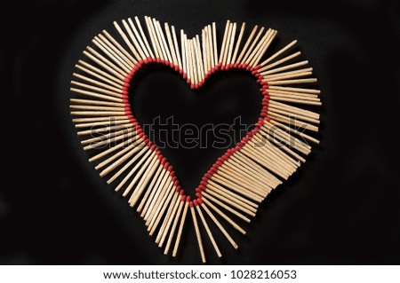 Matches are arranged heart-shape