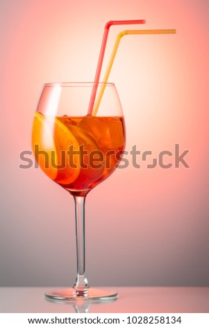 Summer refreshing faintly alcoholic cocktail Aperol spritz in a 