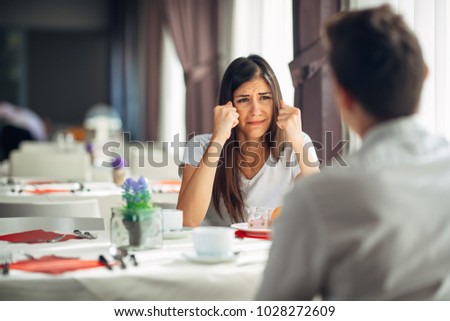 Desperate crying woman fighting and arguing.Hearing bad news,negative event reaction.Emotional face,disappointed person.Problems in life,relationship and work.Anxious woman complaining.Asking for help Royalty-Free Stock Photo #1028272609