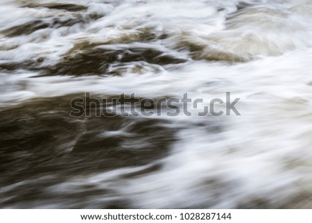 Moving water in river, natural background