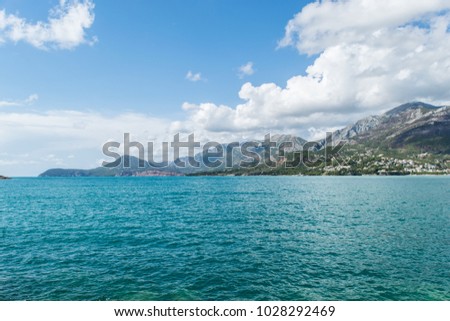 The landscape of the Montenegro coast in Bar. Mountains and clouds in the sunny day.  Royalty-Free Stock Photo #1028292469