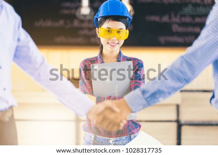 Architect and Engineer handshake after meeting completion