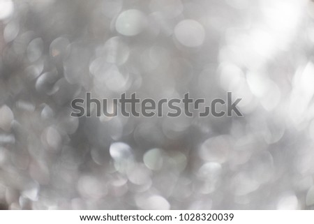 Abstract photo of light and glitter bokeh lights background.