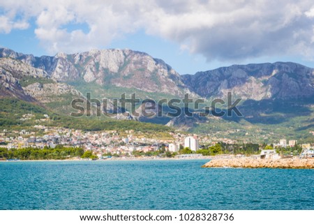 Beautiful landscape above the Bar city in Montenegro. Sunny day with clouds and mountains.  Royalty-Free Stock Photo #1028328736