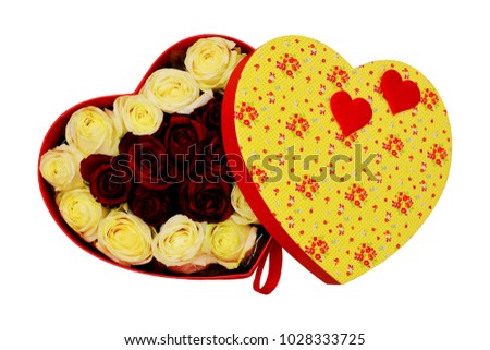 Gift box in the form of heart with scarlet bow, white and red live roses. Valentines Day concept. Isolated, white background.