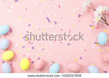 Top view shot of arrangement decoration Happy Easter holiday background concept.Flat lay colorful bunny eggs with accessory ornament on modern beautiful pink paper at office desk.Design pastel tone.