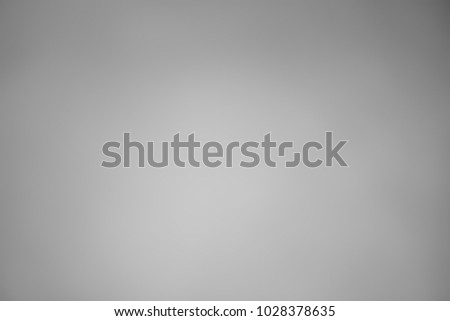 Grey gradient abstract blurred background.