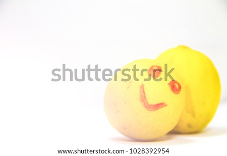 yellow lemon with sunlight  isolated on white background,Drink lemon juice and then refreshing smile concept.