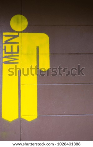 Yellow Male Toilet Wall