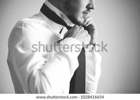 portrait of a happy groom