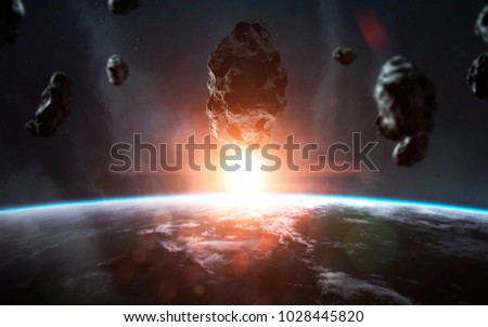 End of Earth. Apocalypse, asteroid explodes the planet. Meteorite shower. Elements of this image furnished by NASA