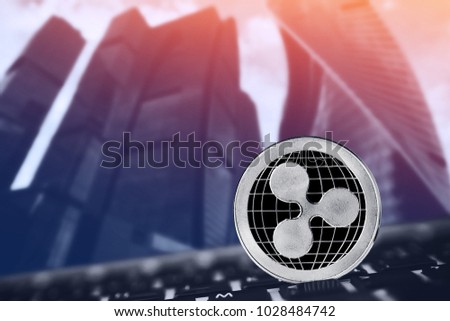 Ripple. coin xrp on background keyboard pc ico