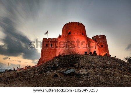 Spectacular View of Fujairah Fort in United Arab Emirates at night Royalty-Free Stock Photo #1028493253