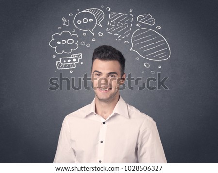 Young casual businessman with drawn speech bubbles over his head