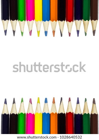 line of colored pencils  on white background