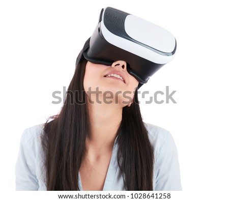 Young woman is using VR headset isolated on white background