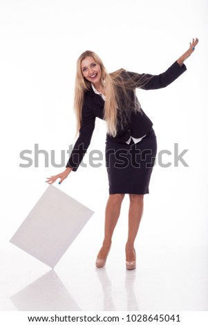 Blonde with long hair posing with a white plate for posting a logo, advertising. A photo on a white background for advertising. Different poses and emotions. Dressed in a business black suit, skirt