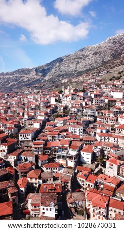 Aerial drone photo of iconic village of Arachova at winter, Voiotia, Greece