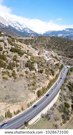 Aerial drone photo of road leading to iconic village of Arachova, Voiotia, Greece