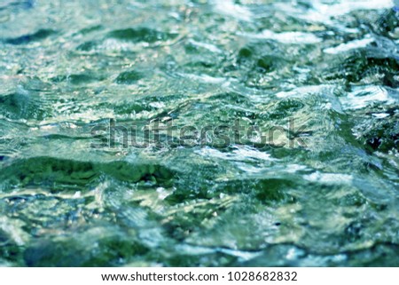 Background image. Magical flicker of water, relax. Widescreen photo. Can be used as a background or advertising design, in which space is copied.