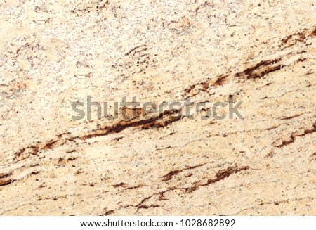 Background image, marble tiles. Solid structure, beautiful and varied coloration with dark veins. Widescreen photo. Can be used as a background or advertising design, in which copy space