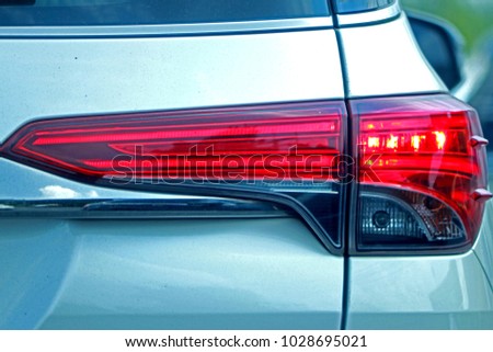 Car taillight texture on the road