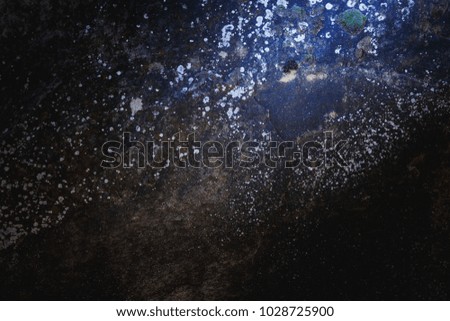 The universe in stone. Galactic space, stars, milky way, formed in the texture of the rock blocks. As an abstract background for design.
