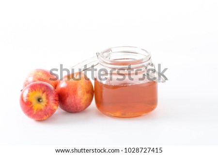 Apple Cider Vinegar and Red Apples on White Background