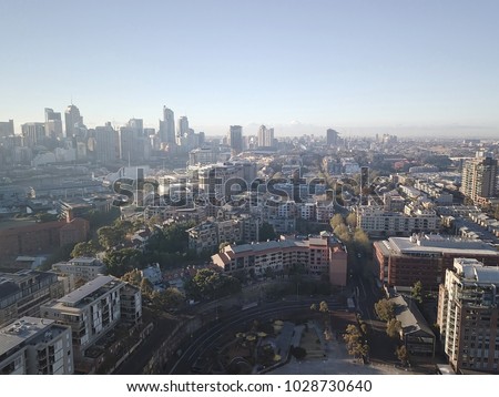 Aerial view of generic cityscape skyline at morning, bird eye view of Sydney city architecture in Australia
