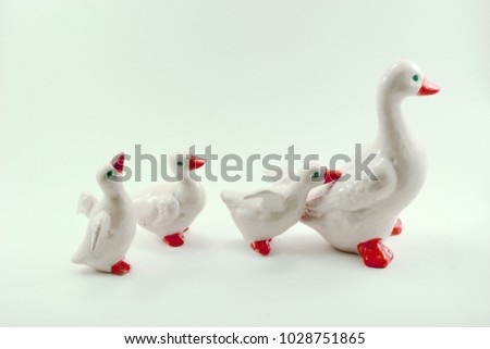 Little duckling following they moms Royalty-Free Stock Photo #1028751865
