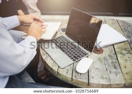 businessman use smartphone and laptop on  table desk business ideas concept
