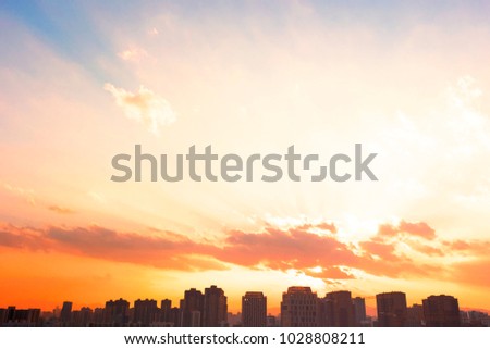 Orange sunset and cloud over cityscape Kiev