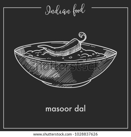 Masoor dal with chili pepper in bowl from Indian food Royalty-Free Stock Photo #1028837626