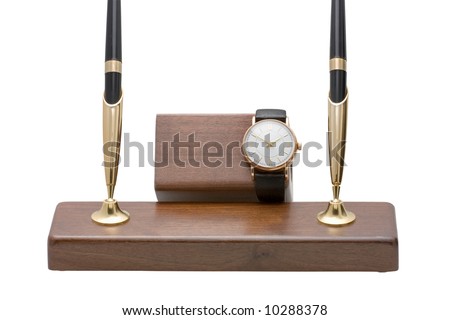 Fragment of a desktop set with writing handles and hours isolated on a white background
