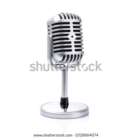 Retro microphone isolated on white background Royalty-Free Stock Photo #1028864074