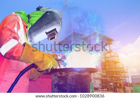 double exposure worker welding operator by wear equipment protection mask welding for safety with the factory background and construction industrial concept